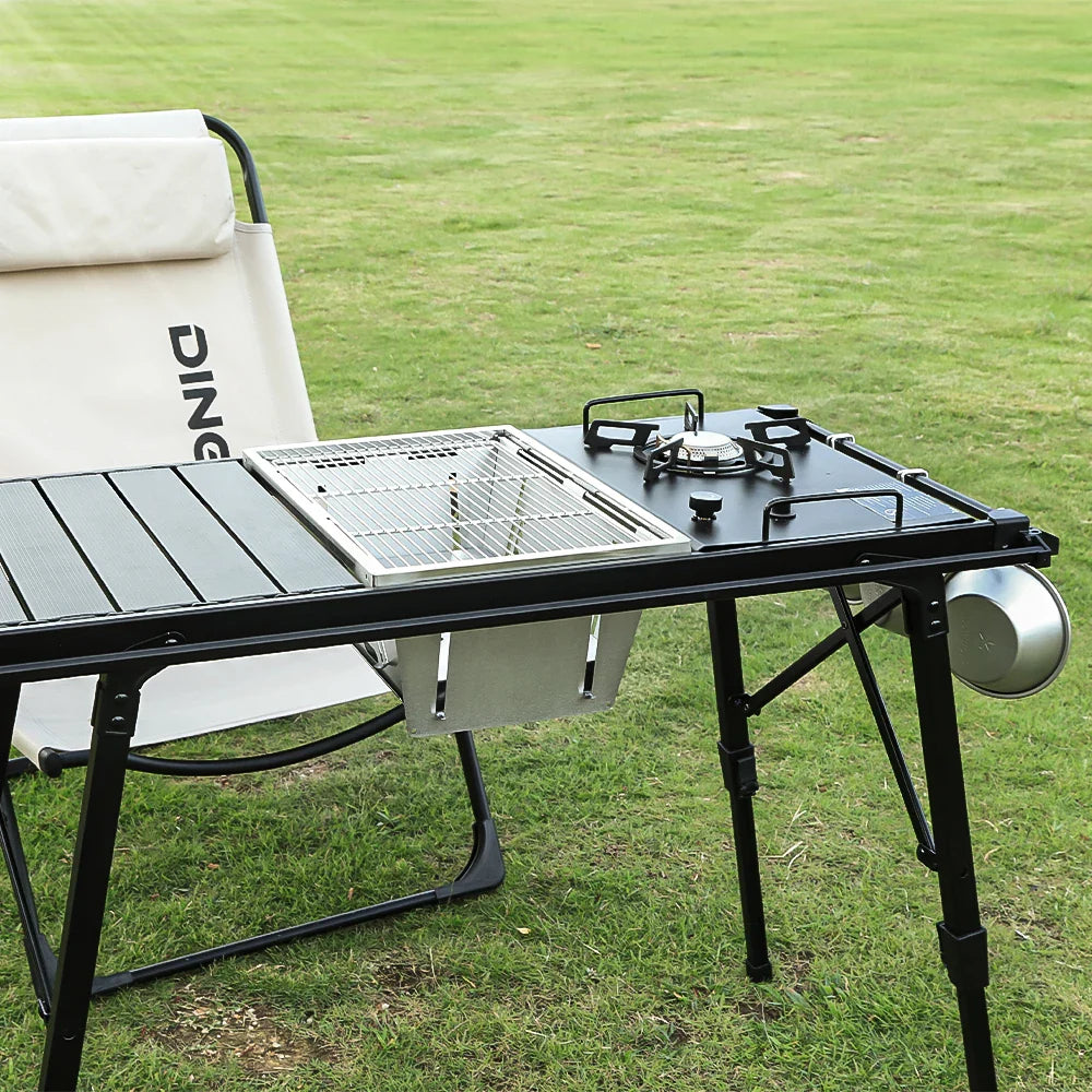 Klappbarer IGT-Campingtisch mit Holzkohlegrill und Kocher-Einschüben