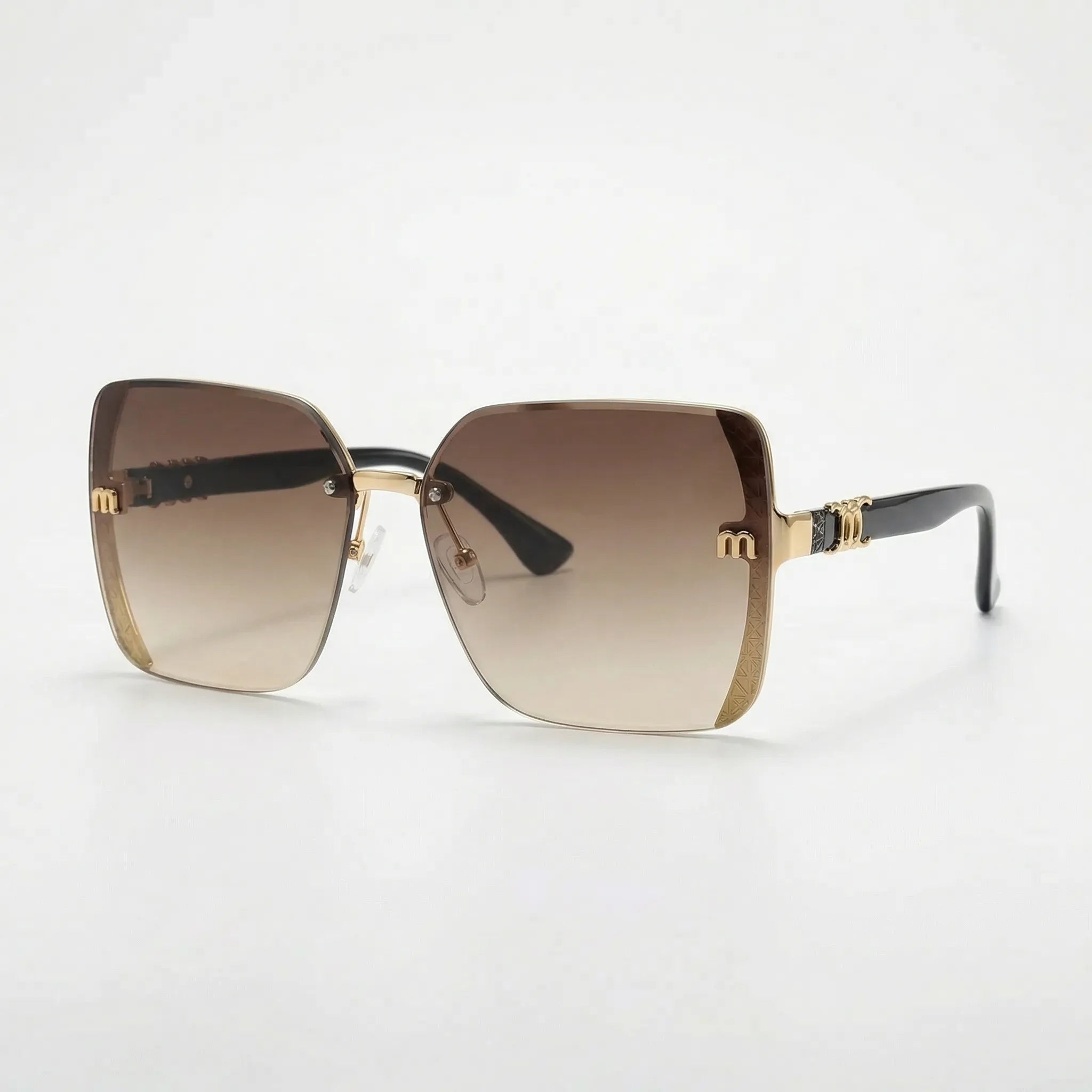Randlose Sonnenbrille mit Farbverlauf und glitzerbesetzter Brücke