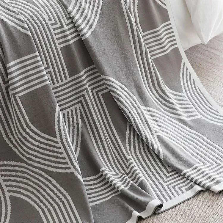 Modernes geometrisches Wurfplaid gestrickt mit warmem weichem Finish