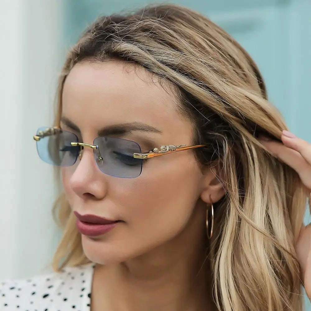 Randlose Quadratische Sonnenbrille mit Leoparden-Bügeldetails Goldton