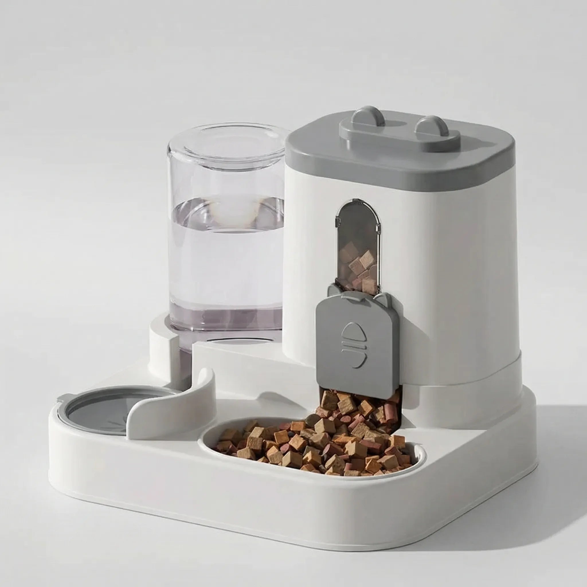 Automatischer Futterspender und Wassernapf für Haustiere mit Schwerkraftfunktion