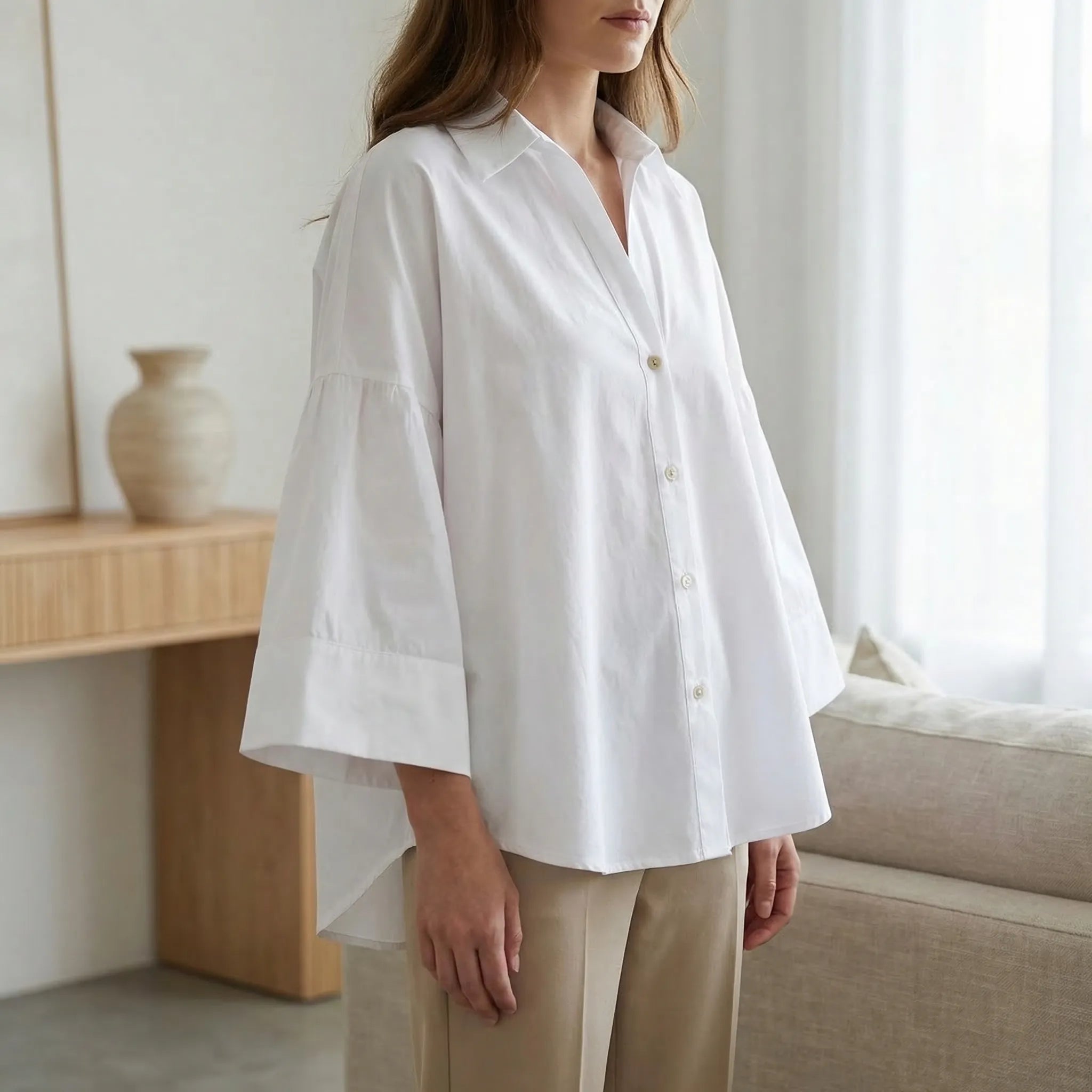 Breitleinen-Bluse mit asymmetrischem Saum und Johnny-Kragen Knopfleiste