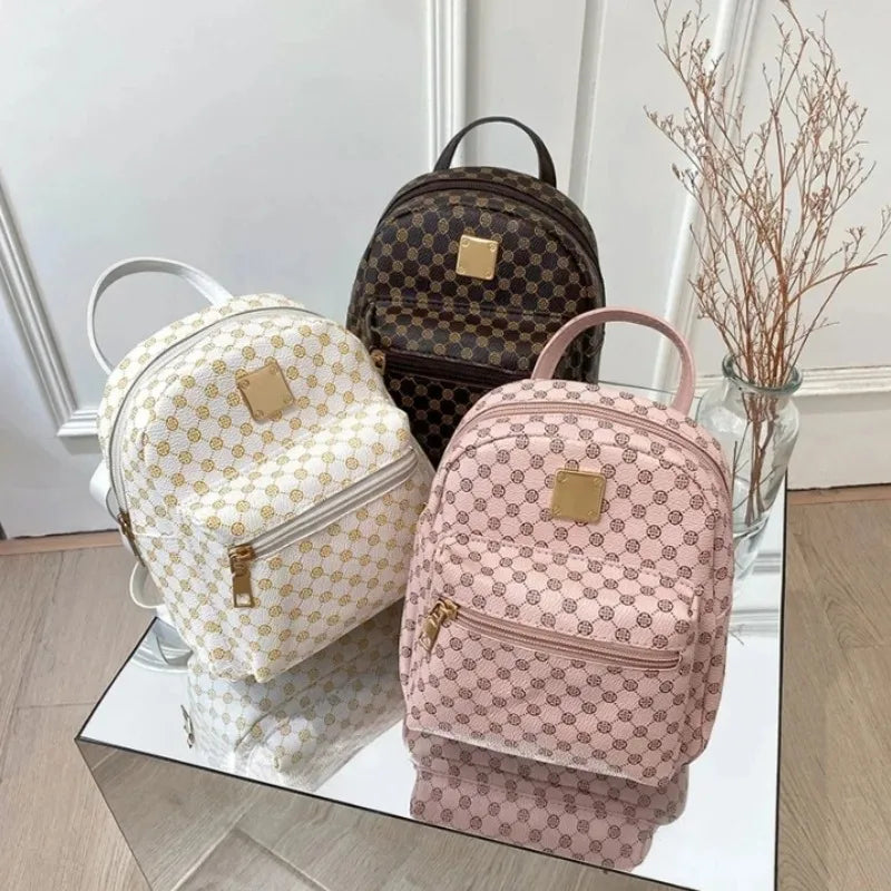 Kompakter modischer Rucksack mit gemustertem Design und Reißverschlusstasche