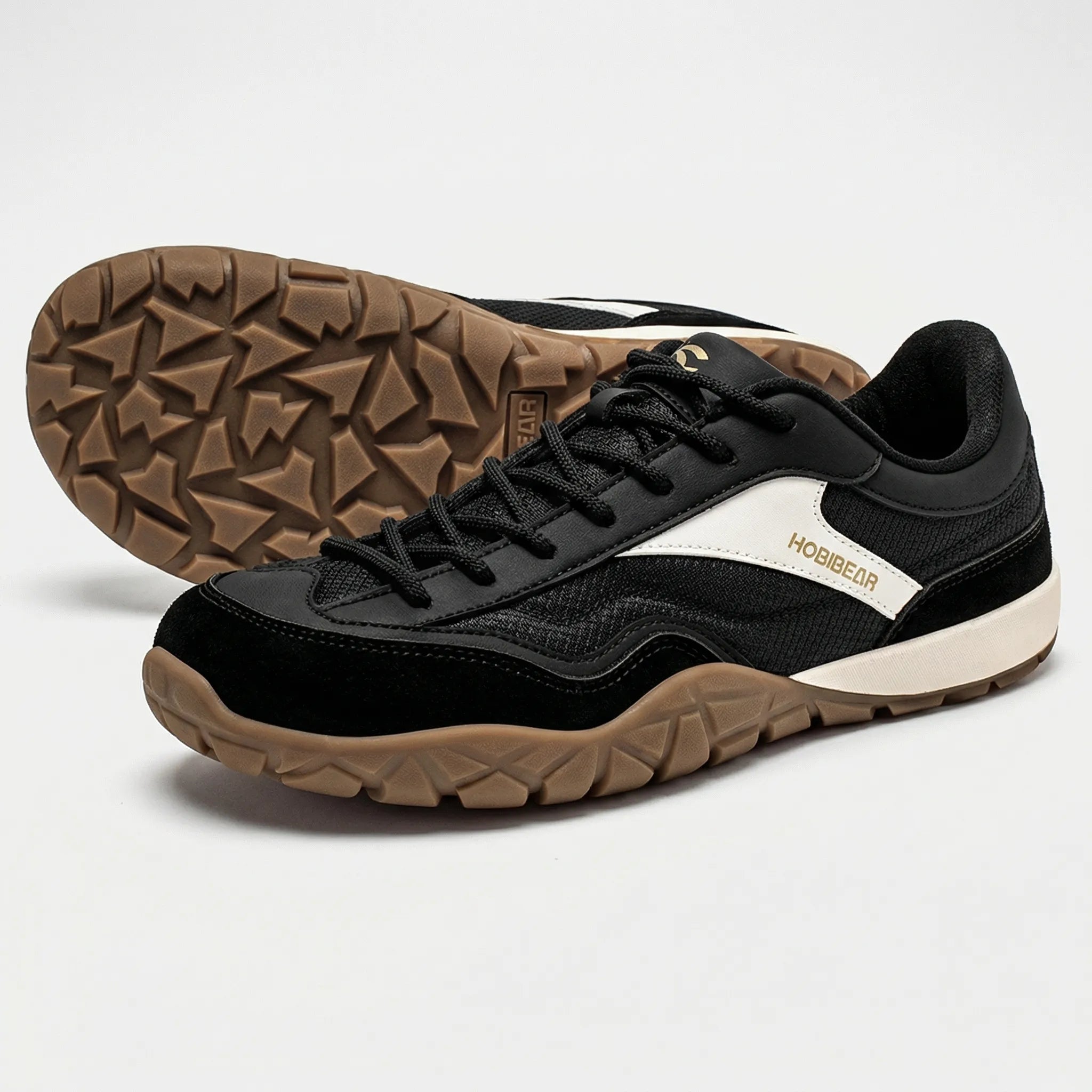 Breitschaftiger Trailwanderschuh mit rutschfester Sohle und Retro-Design