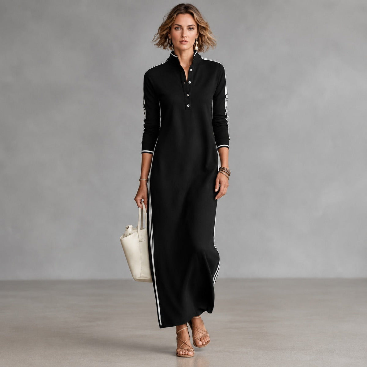 Kleid mit Polokragen, seitlichen Streifen und langer Schnittform