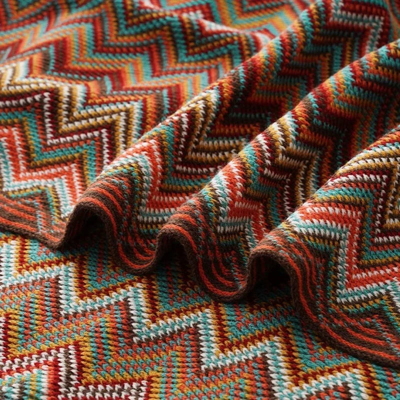 Bunte Strickdecke geometrische Streifen Fransen Bohème-Design