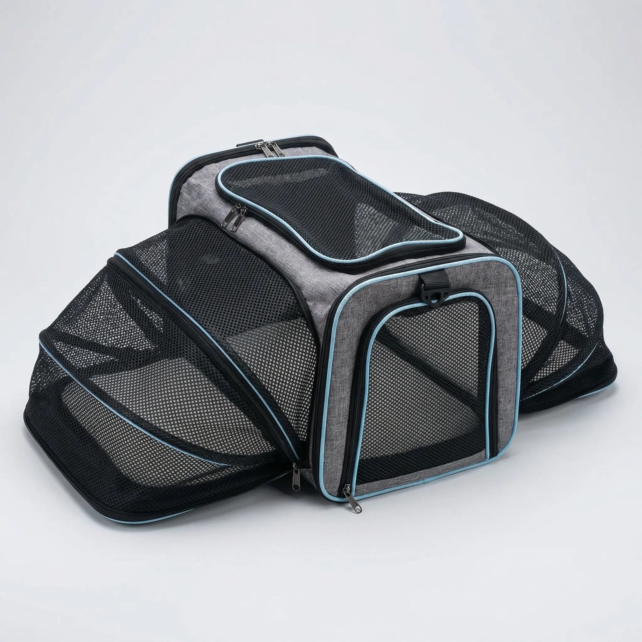Erweiterbare Haustiertransportbox mit Meshpaneelen und Schultergurt