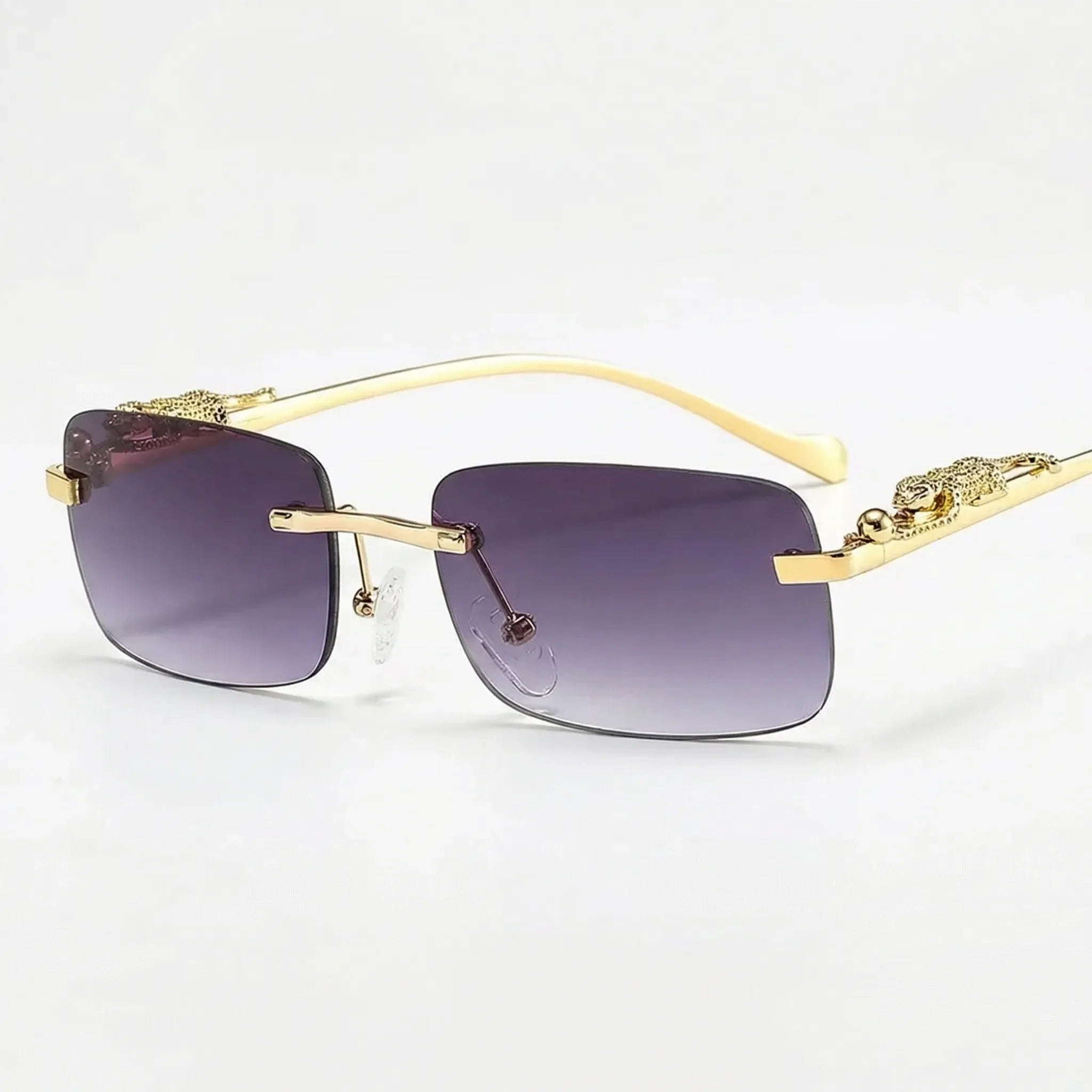 Randlose Quadratische Sonnenbrille mit Leoparden-Bügeldetails Goldton