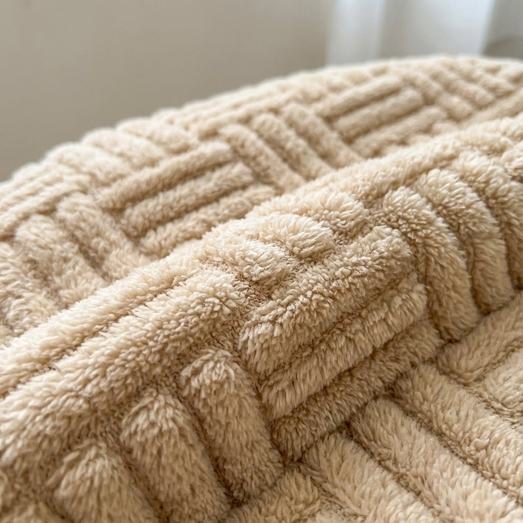 Wurfdecke mit wolkenweicher Jacquard-Textur und geometrischem Design