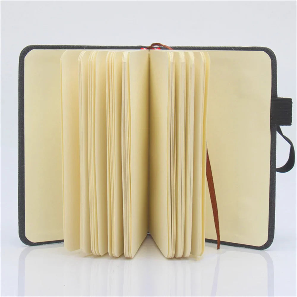 A7 Taschennotizbuch mit Spiralbindung und Stifthalter