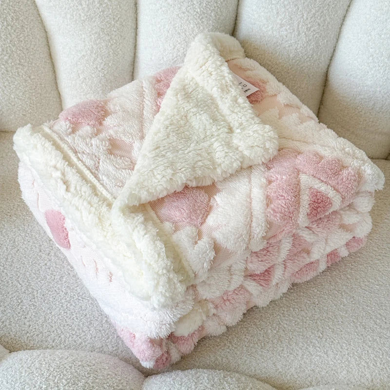 Doppellagige Jacquard-Wurfdecke mit geometrischem Muster und plüschiger Innenseite