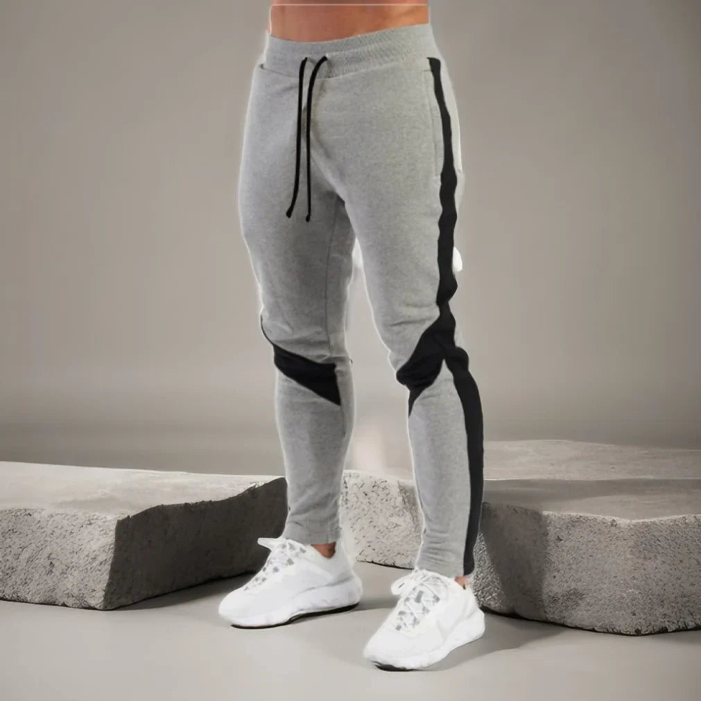 Schlanke athletische Jogger-Hose mit Seitenpanels und Tunnelzug